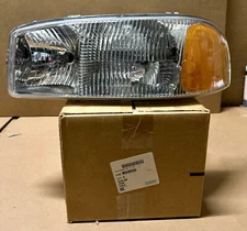 NOS GM Head Lamp Sierra '99-'07, Yukon '00-'06 - Driver Side #16526135