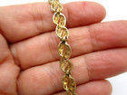 10K Yellow & White Gold Diamond-Cut Wavy Link Bracelet — photo 5