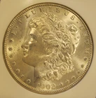1902 O Morgan Silver Dollar  -BU, Frosty, Light gold peripheral toning 5202