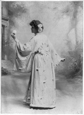 Women's fashions: kimono,white with bird print ,woman,flowers in her hair