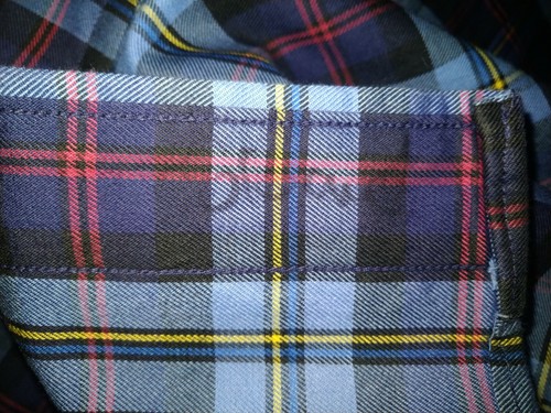 Blue and red plaid fabric with yellow and black trim, made in USA, Sz L.