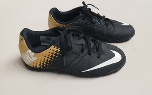 black and gold turf shoes