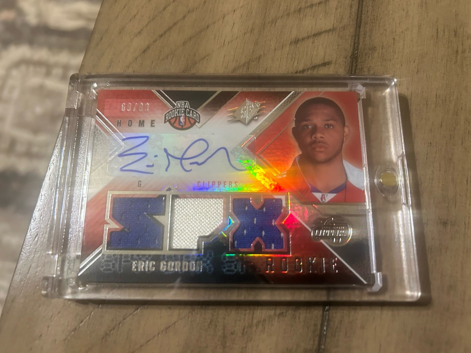     2008-09 SPx Eric Gordon RC Auto Triple Jersey Patch /99 #116 Clippers