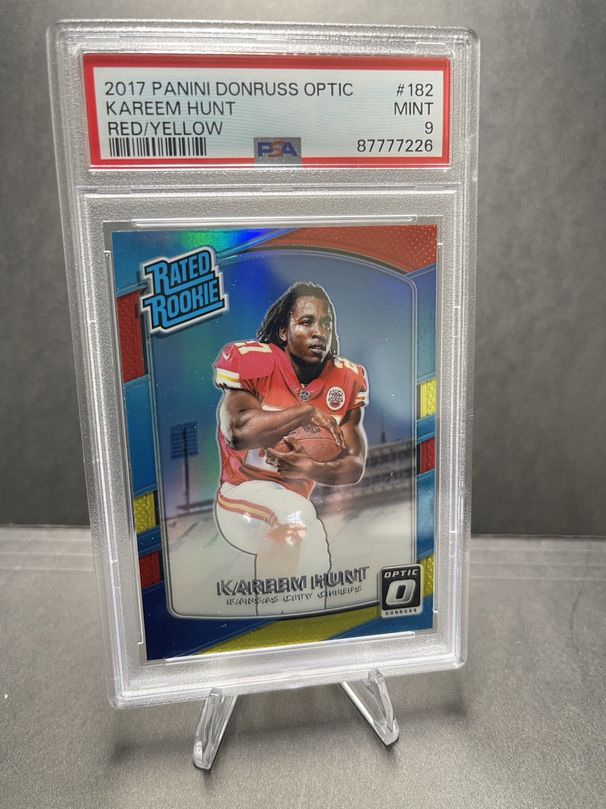 2017 Donruss Optic - Rated Rookie Kareem Hunt #182 Red & Yellow Prizm (RC) PSA 9