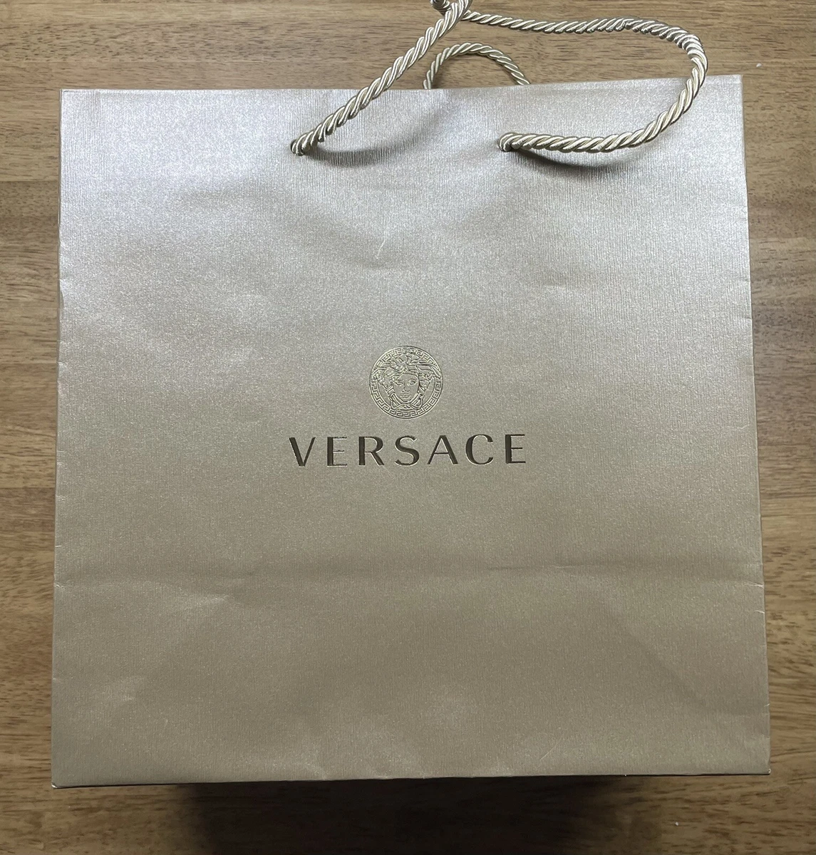 Versace store gold bag
