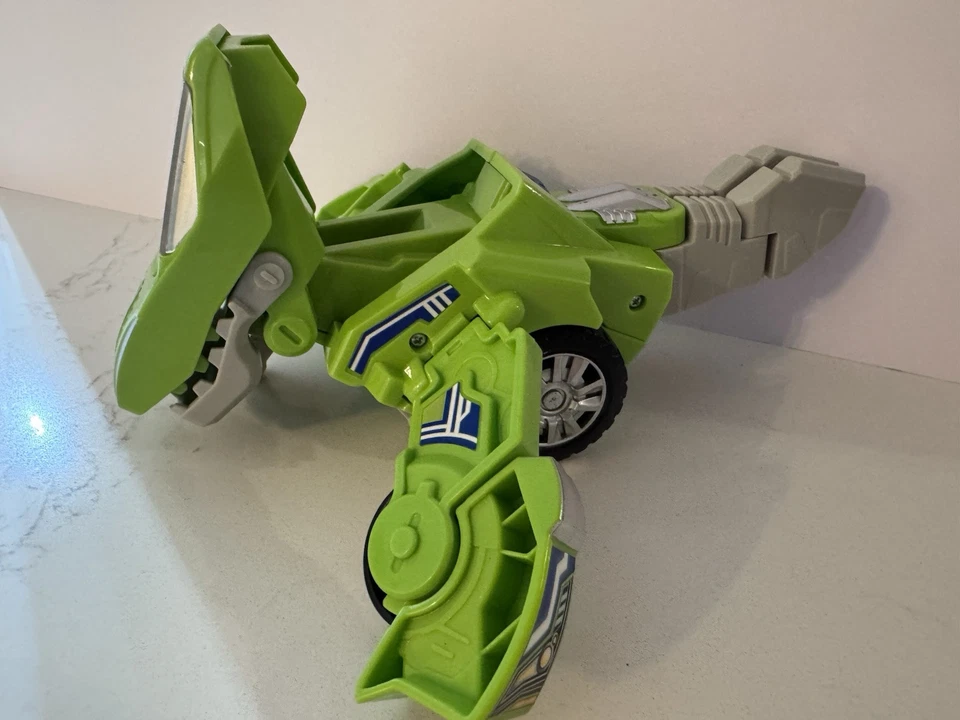Vtech Dinos T-Rex Switch and Go Transform Vehicle Figure Sliver Green Race Car - Image 2 of 4