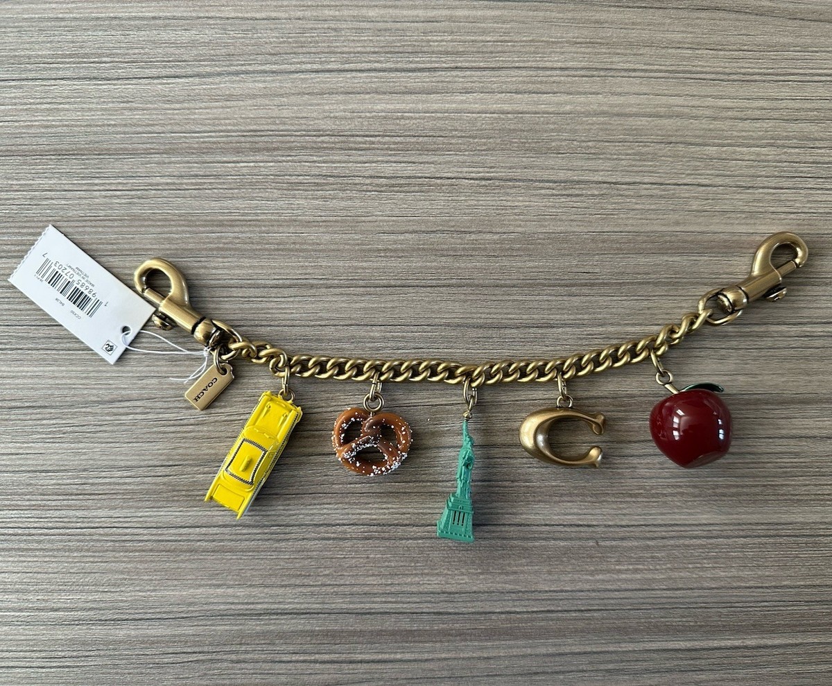 NWT Coach New York Motif Chain Bag Charm Apple Pretzel Taxi Brass