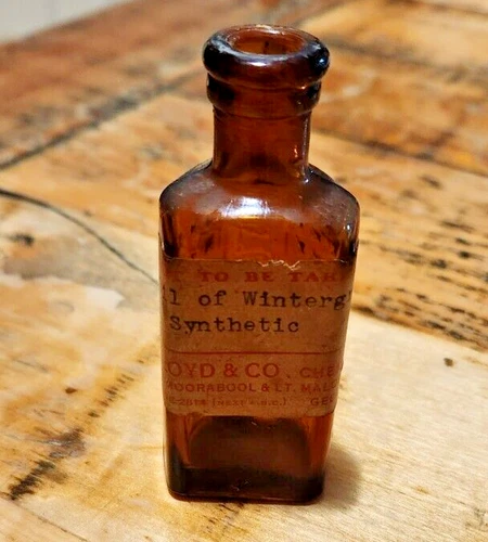posion bottle labeled oil of wintergreen 9 cm