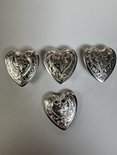 Four sterling silver conchos heart