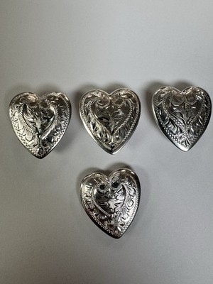 Four sterling silver conchos heart
