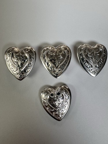 Four sterling silver conchos heart