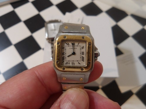 Cartier Santos 1567, Movado Watch & Handy Cam