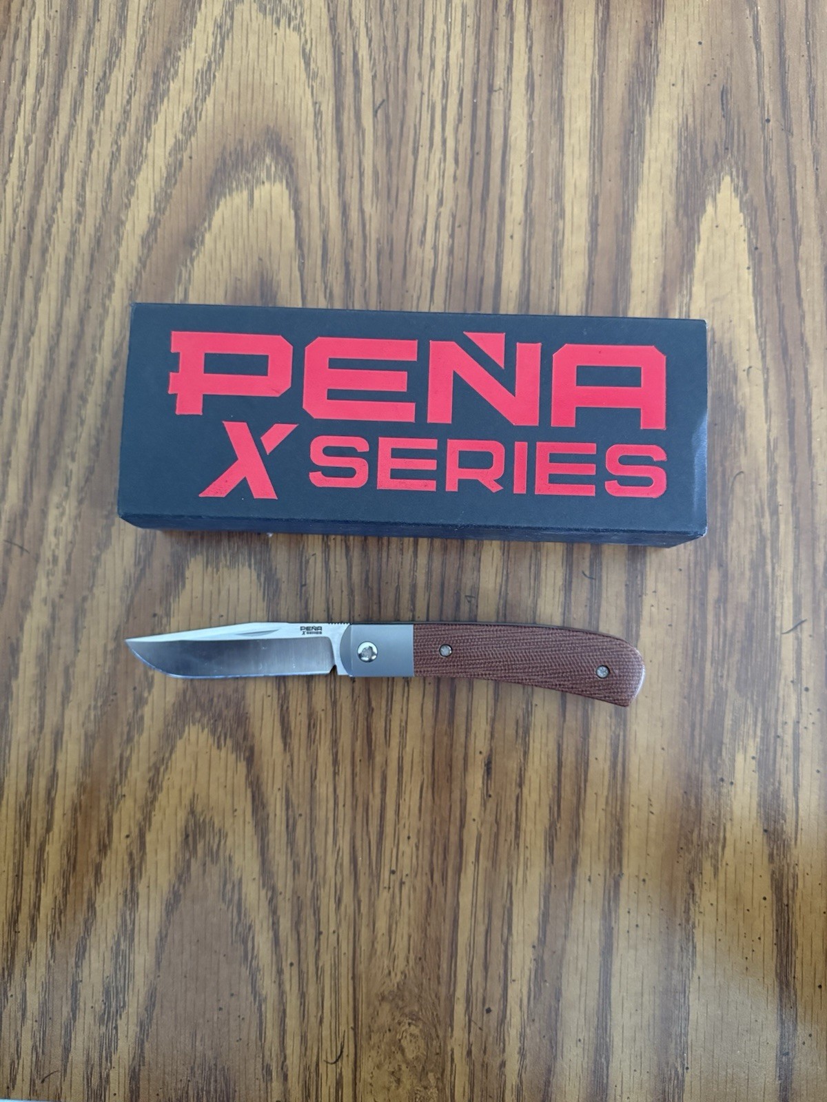 Pena X Series Trapper Folding Knife 3.25" M390 Brown Micarta Titanium Bolsters