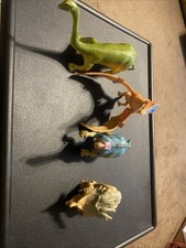 Lot of 4 Plastic Dinosaur Figures Pretend Play Toys for Ages 3-7 Assorted Colors