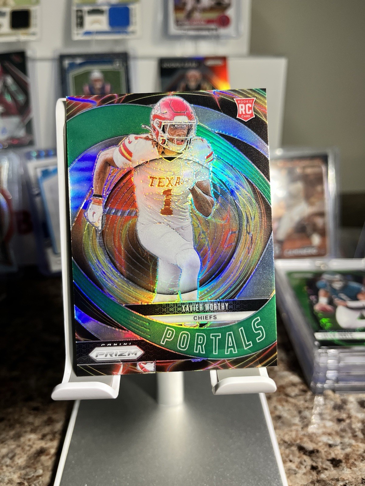 2024 Panini Prizm - Portals Xavier Worthy #10 Green Ice Prizm (RC)