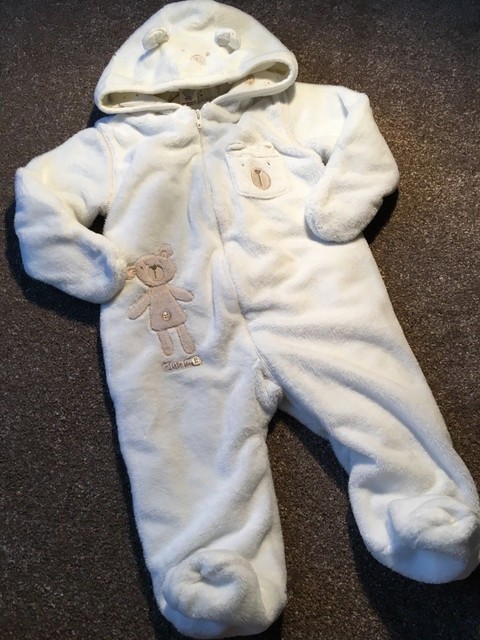 cream pram suit