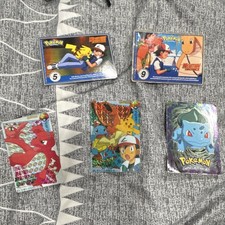 Bandai Pokémon Vintage Anime Trading Card Lot 1998 Ash Pikachu Charizard.