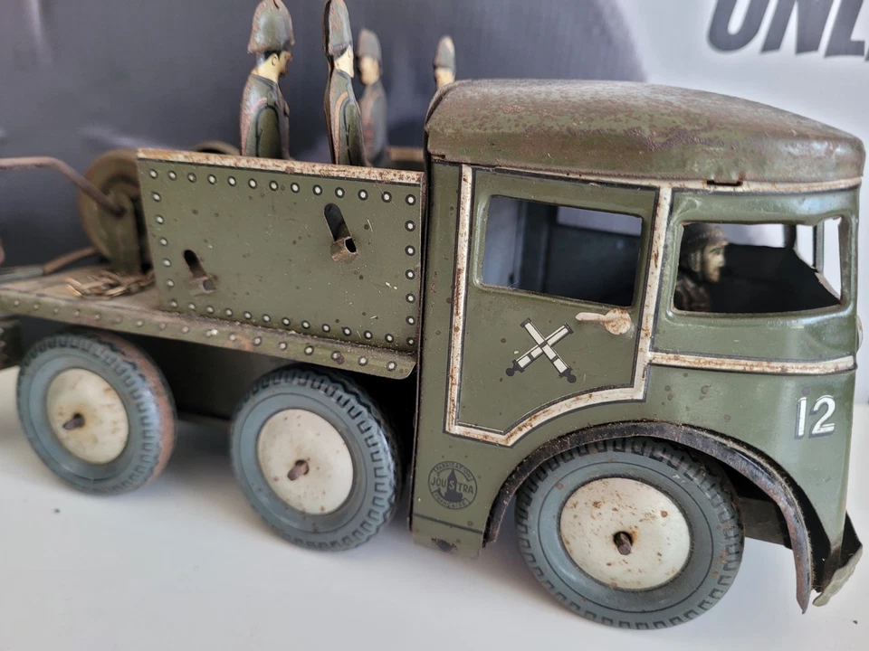 Camión militar de hojalata Joustra y cañón de campo años 30 Francia Wind-Up Works Foto 2 de 4