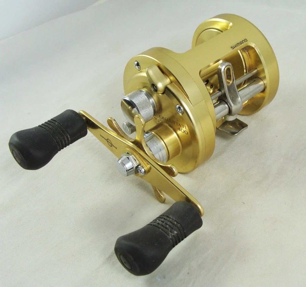 Preços baixos em Shimano Calcutta 400 Molinetes E Carretilhas de