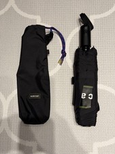 USED NEW SACAI FOLDING UMBRELLA, PUSH BUTTON UNUSED