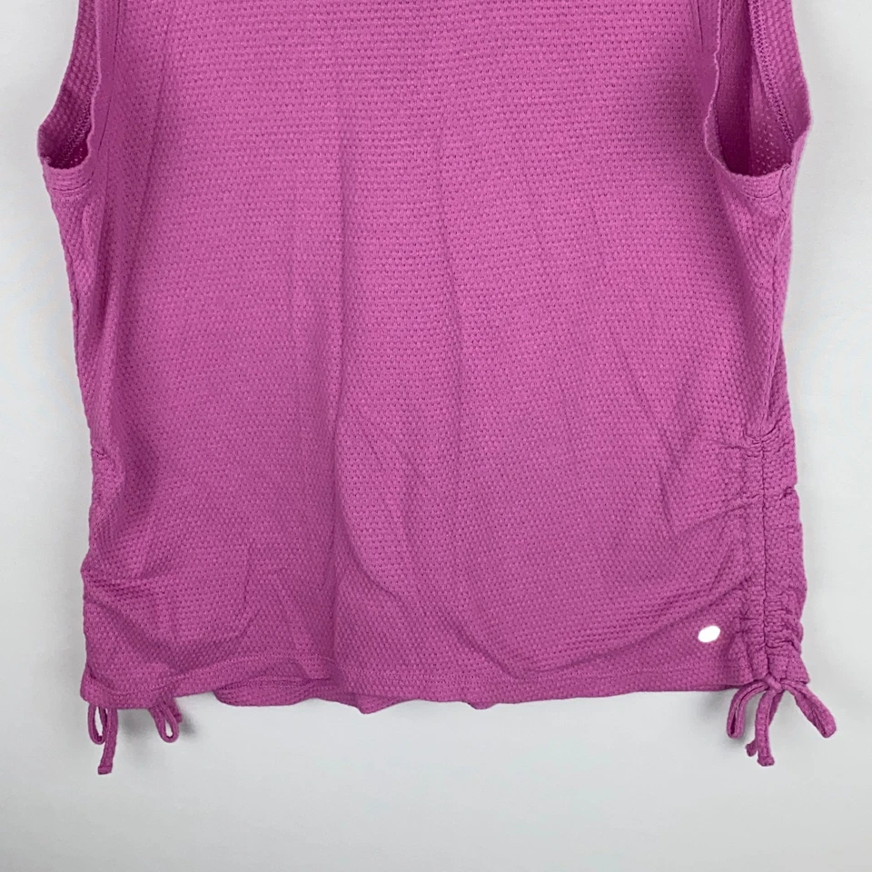 Top deportivo RBX Activewear para mujer sin mangas rosa estampado elevado lados ajustables Foto 4 de 4