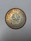 Photo of a 1957 Mexico 10 Pesos Silver from an eBay listing that sold on May 10, 2026