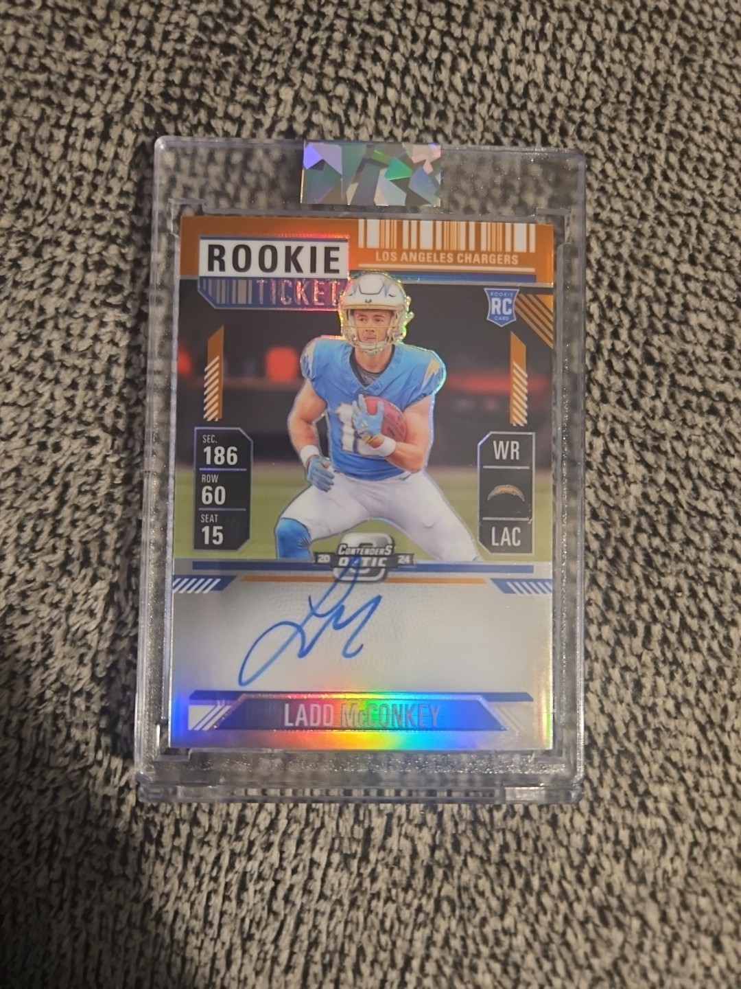 2024 Contenders Optic Ladd McConkey Orange Rookie Ticket Auto /50