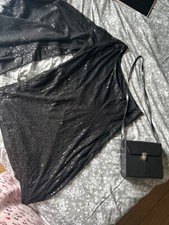 A sparkling black dress