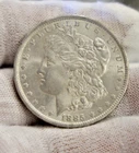 1885 O US Morgan Silver Dollar $1 AU (Cleaned)
