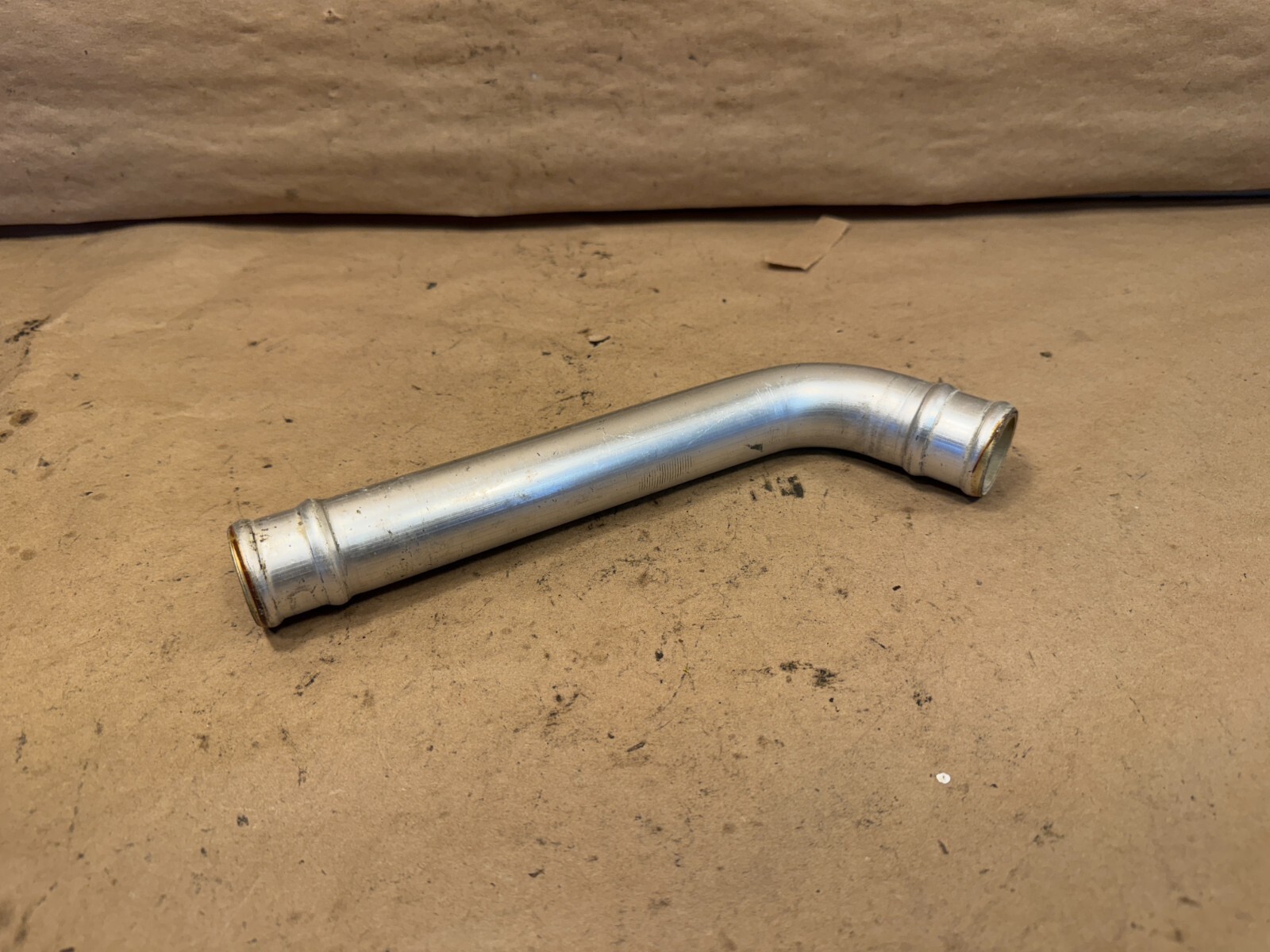 Ferrari Testarossa LEFT Coolant pipe P/N 121122