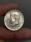 1964- P Kennedy Half Dollar. #E