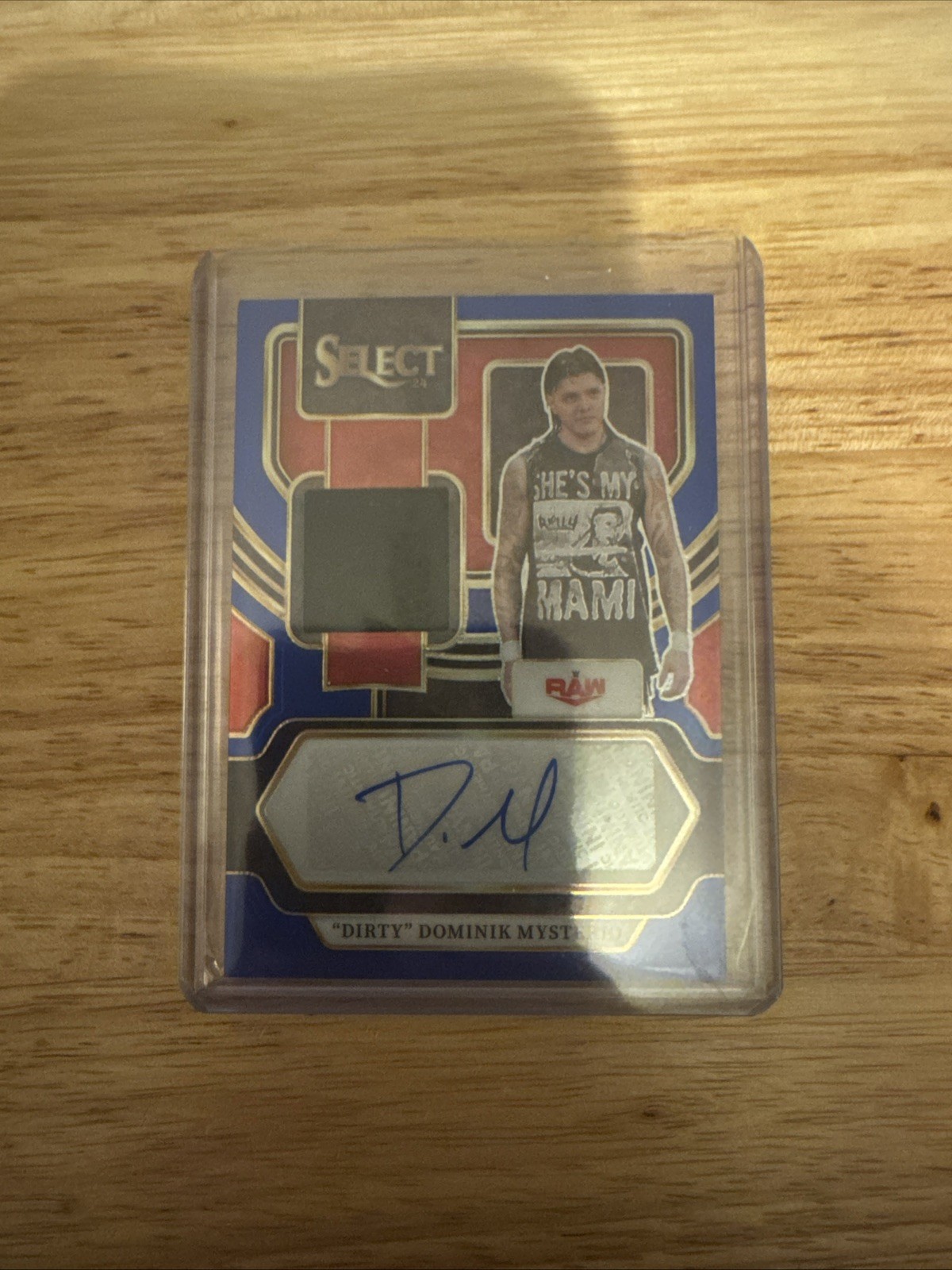 2024 Panini Select WWE  Dirty Dominik Mysterio Dual Auto/Relic 25/35 No.AM-DDM