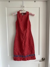 Lord & Taylor classic red dress with handmade design in the bottom of dress.