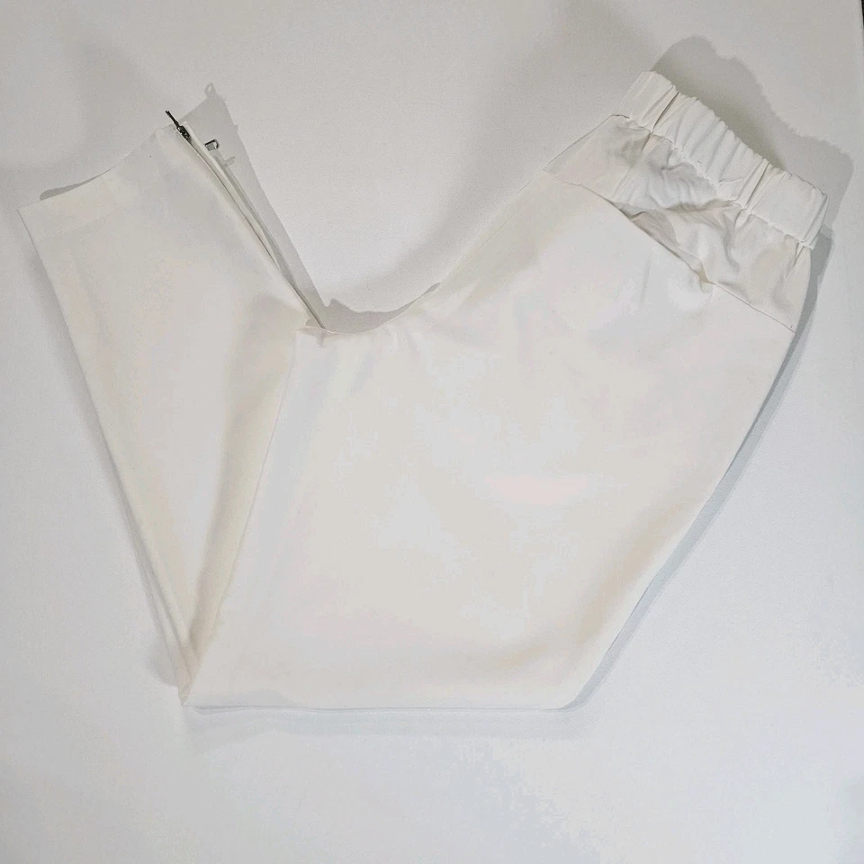 Pantalones para mujer Calvin Klein talla 10 color crema cremallera al tobillo pantalones plisados informales Foto 2 de 4