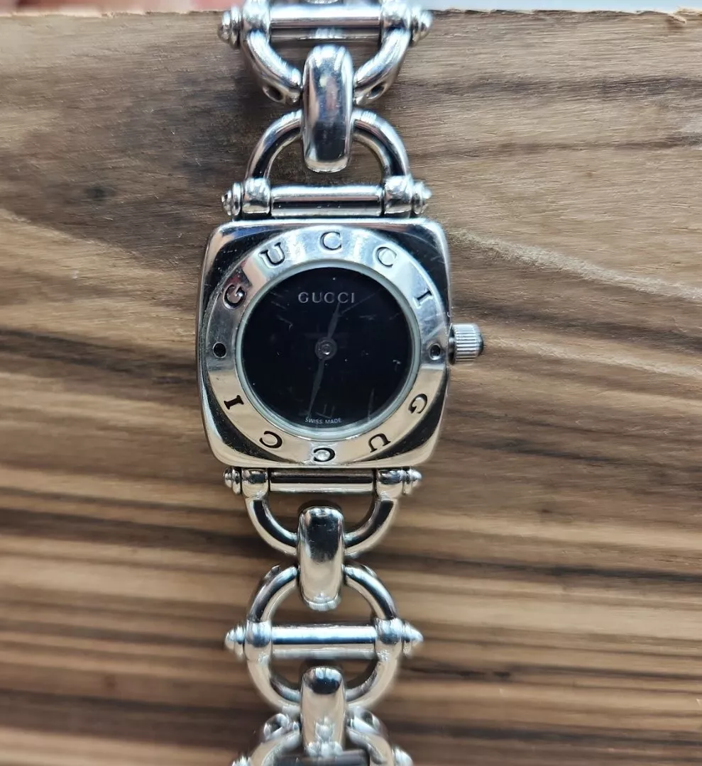 Montre pour femme Horebit cadran noir GUCCI 6400L en acier inoxydable.