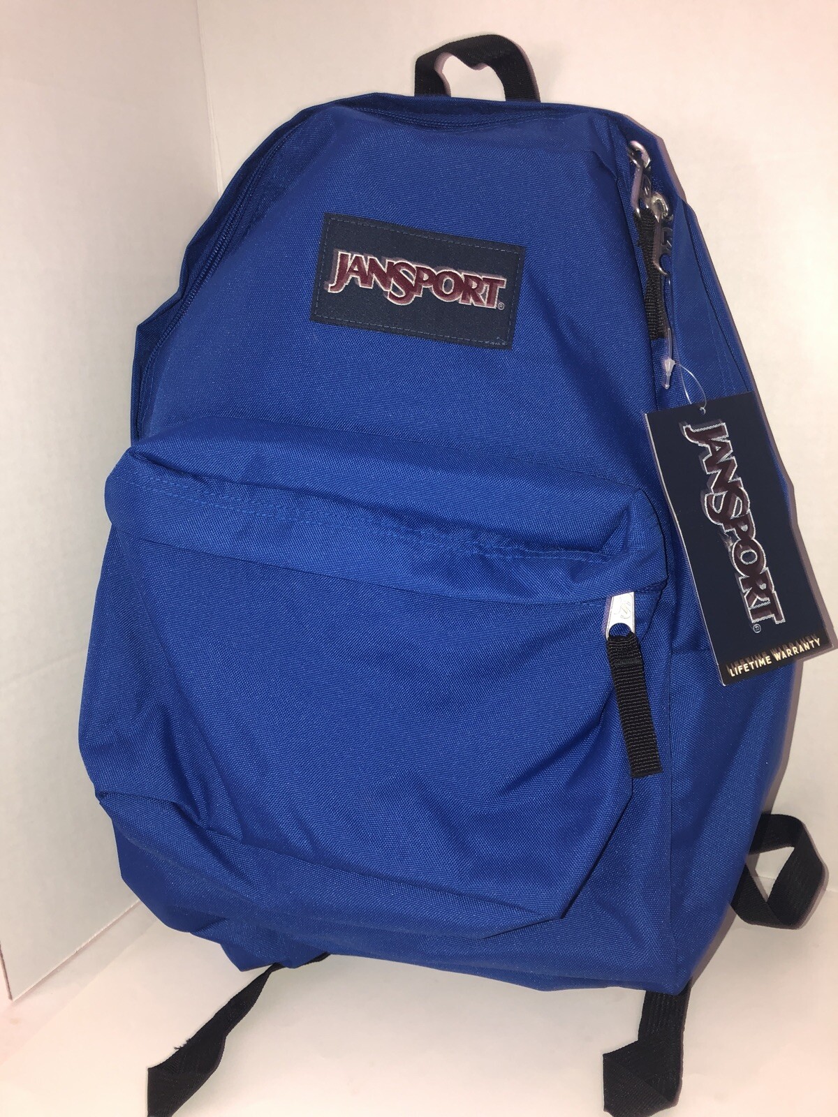 bright blue jansport backpack