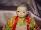 VINTAGE ORIENTAL STYLE CHINA HEAD & CLOTH BABY DOLL — photo 6