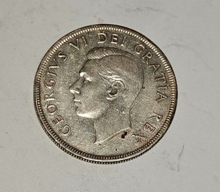Older silver coin from Canada 1950 Dollar