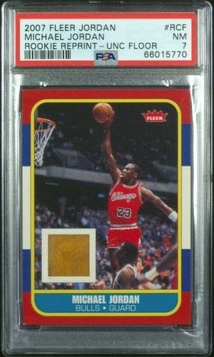 2007 FLEER MICHAEL JORDAN 1986-TRIBUTE ROOKIE REPRINT UNC FLOOR GAME-USED PSA 7