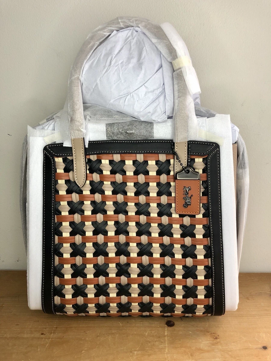 Troupe tote with weaving outlet