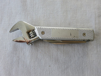 Multi-Function Pocket Tool, Crescent Wrench, Knife, Saw and Philips Screw Driver