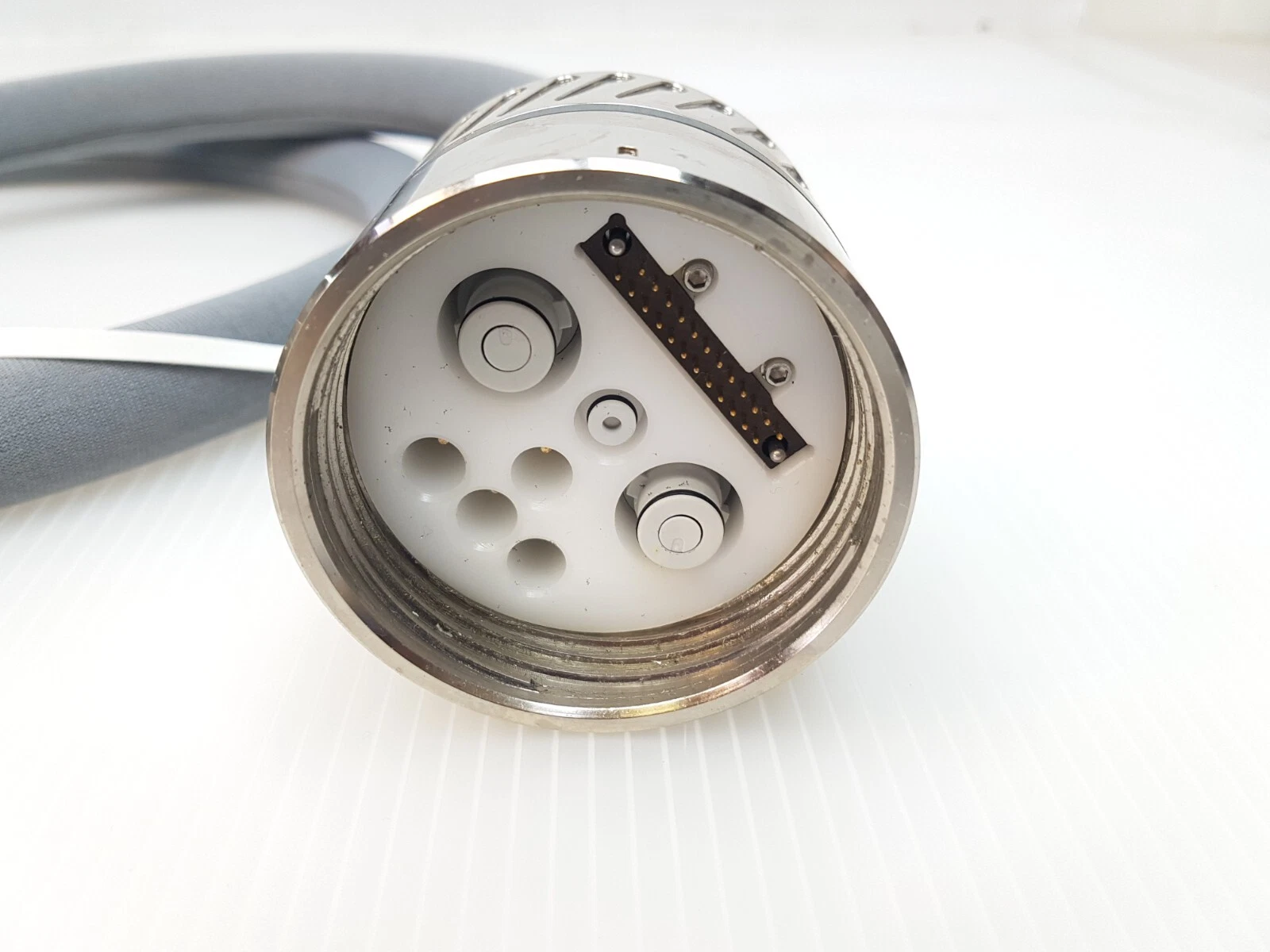 Connector face of the LightSheer handpiece cable with multi-pin connector
