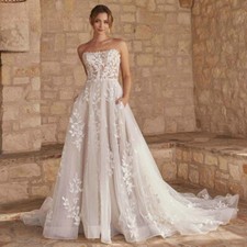 Strapless Tulle Wedding Dresses Appliques Backless Buttons Pockets Bridal Gowns