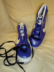 shiny purple nike shoes