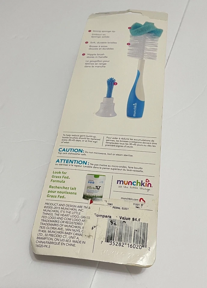 Cepillo esponja para biberón Munchkin con cepillo para pezones dentro del mango Foto 3 de 3