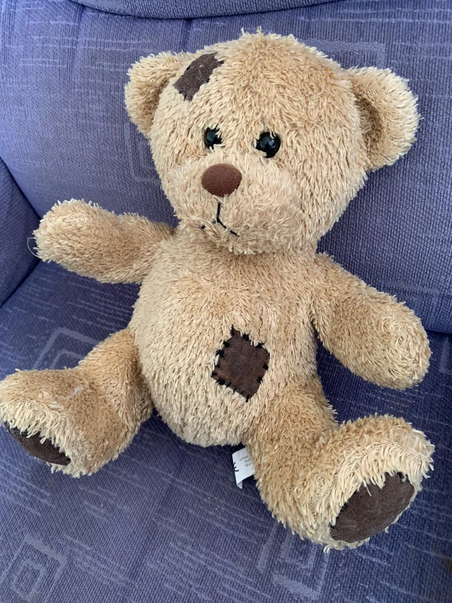 Cuddly teddy bear approximately 9 inches in height . Cuddly Bear