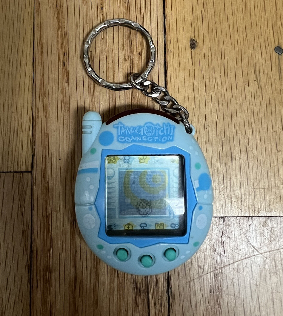 VTG Bandai 2004 Tamagotchi Connection Version 3 Blue Bubbles VTG Bandai 2004 Tamagotchi Connection Version 3 Blue Bubbles