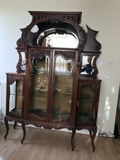 Antique display cabinet with glass doors