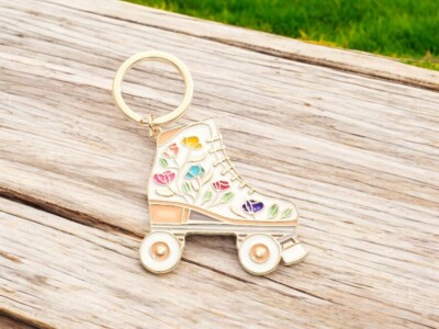 White ''Lets Roll'' Enamel Flower Skate Metal Keychain