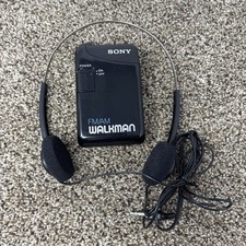 Vintage Sony Walkman SRF-29 Black AM/FM Radio With Belt Clip And Headphones
